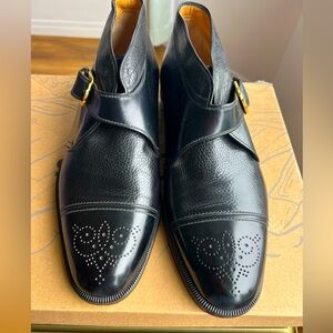 a. testoni Black Leather Oxfords with Brogue Detailing
Exquisite Impeccable